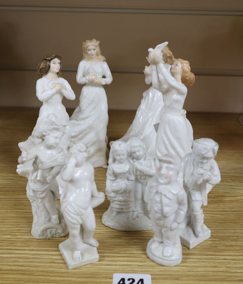 A collection of white glazed figures including Royal Doulton